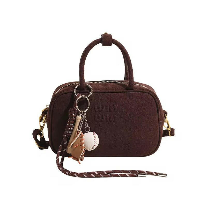 Stylische Damen-Handtasche mit Logo-Prägung und abnehmbarem Schulterriemen.