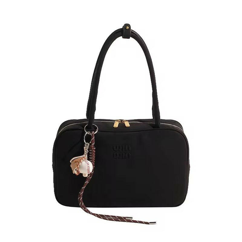 Elegante Damen-Handtasche mit Logo-Prägung und doppelten Tragehenkeln.